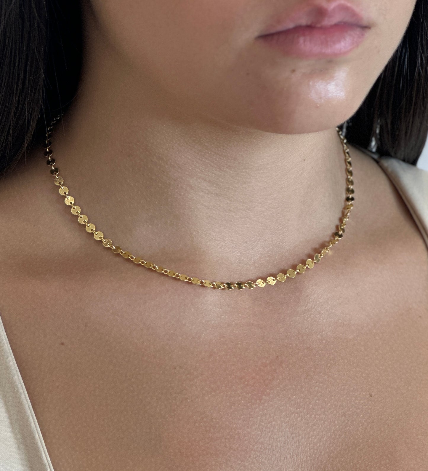 Collana monetine
