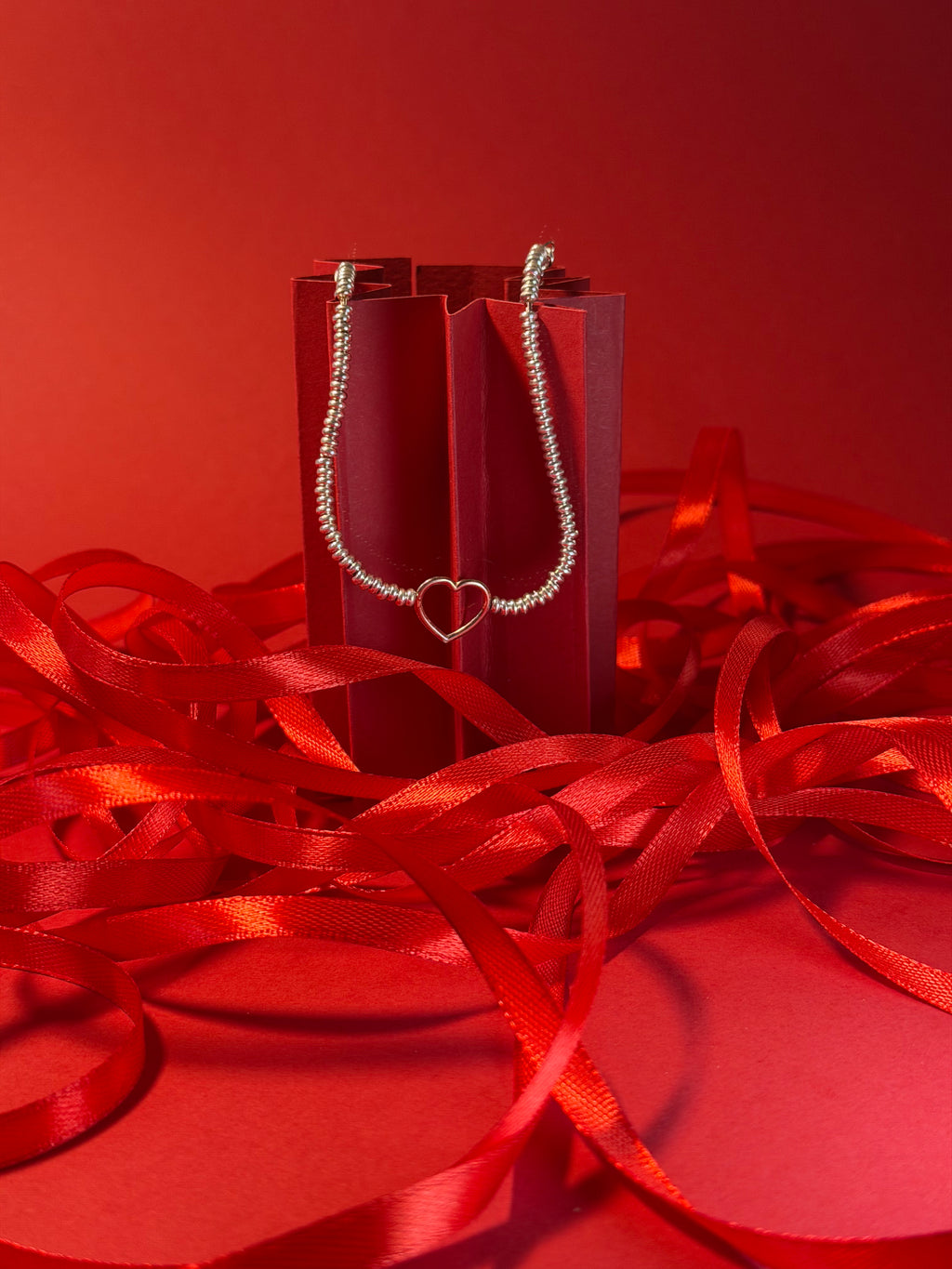 Bracciale rondelle Cuore