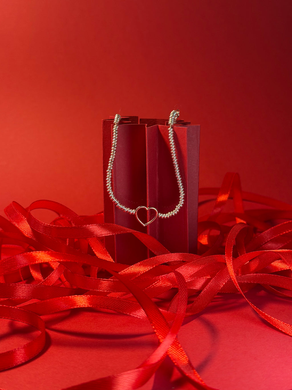 Bracciale rondelle Cuore