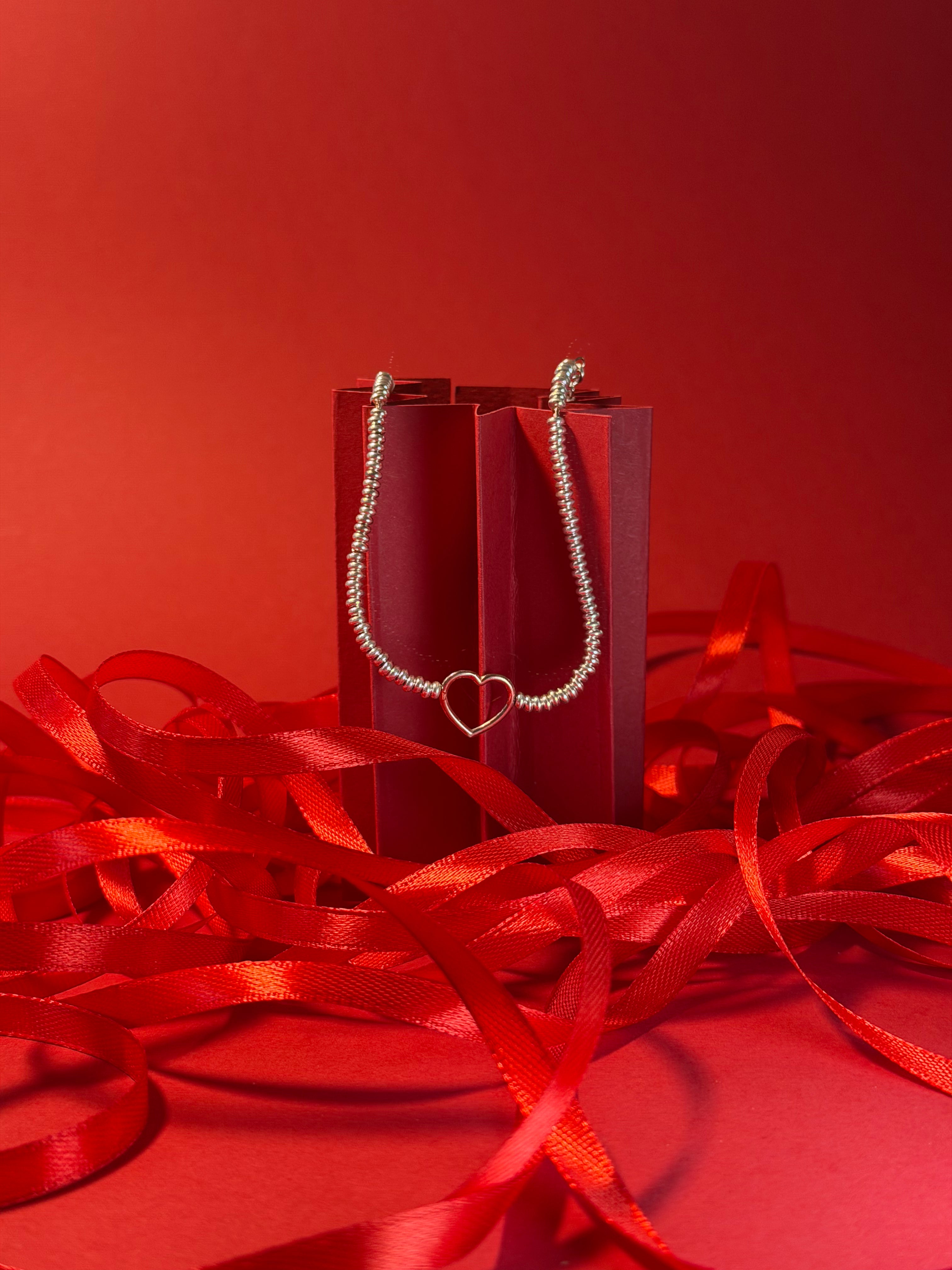 Bracciale rondelle Cuore