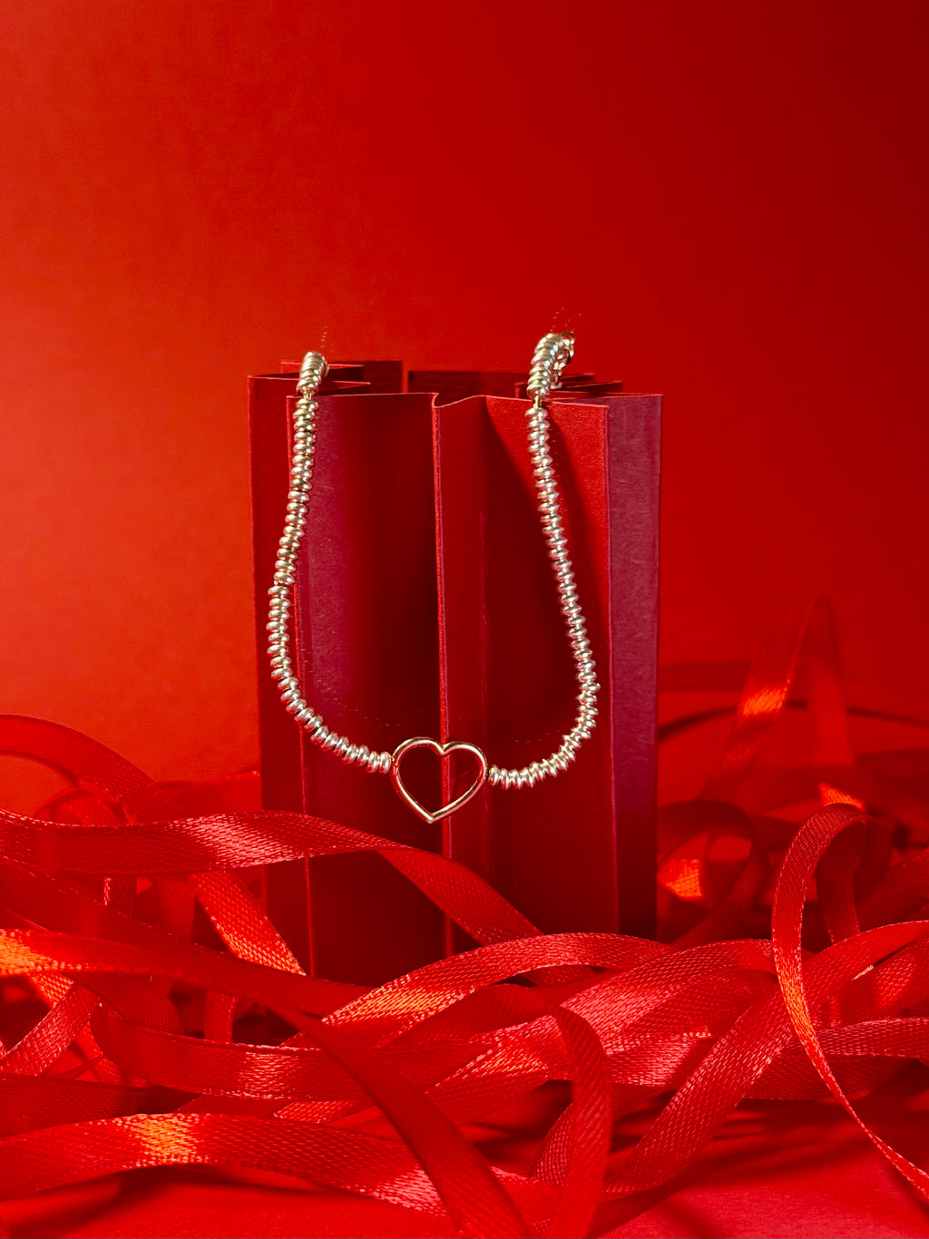 Bracciale rondelle Cuore